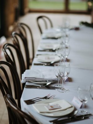 wedding-day-s-decorated-table-with-plates-napkins-wine-glasses-forks-knives (1)